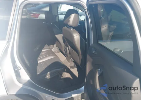 2015 Ford Escape Titanium z USA, uszkodzony, nr VIN 1FMCU0J98FUA15969